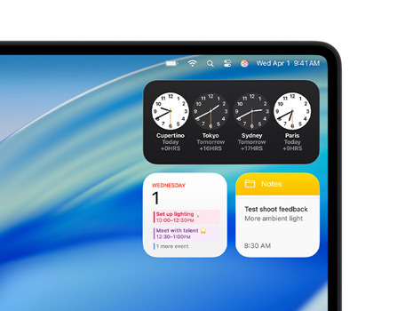 Mac Schreibtisch mit macOS Tahoe und verschiedenen Widgets, darunter Uhr, Kalender und Notizen.